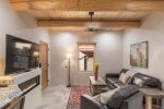 Cozy living room with classic Santa Fe viga ceilings